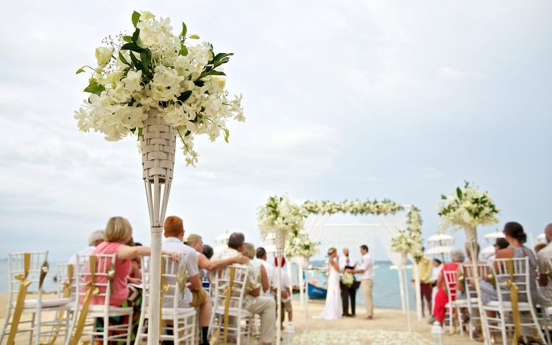 soft focus of beautiful flower decoration in the beach wedding ceremony